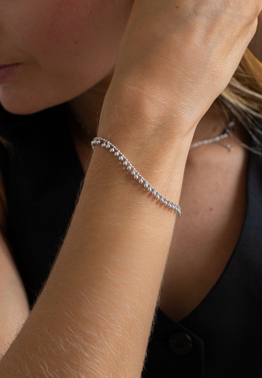 Xylophone bracelet with multiple beads