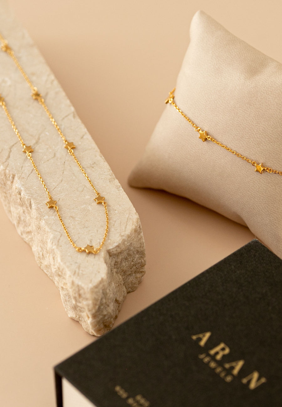 Conjunto de collar y pulsera con estrellas de plata bañado en oro STARS SET GLD