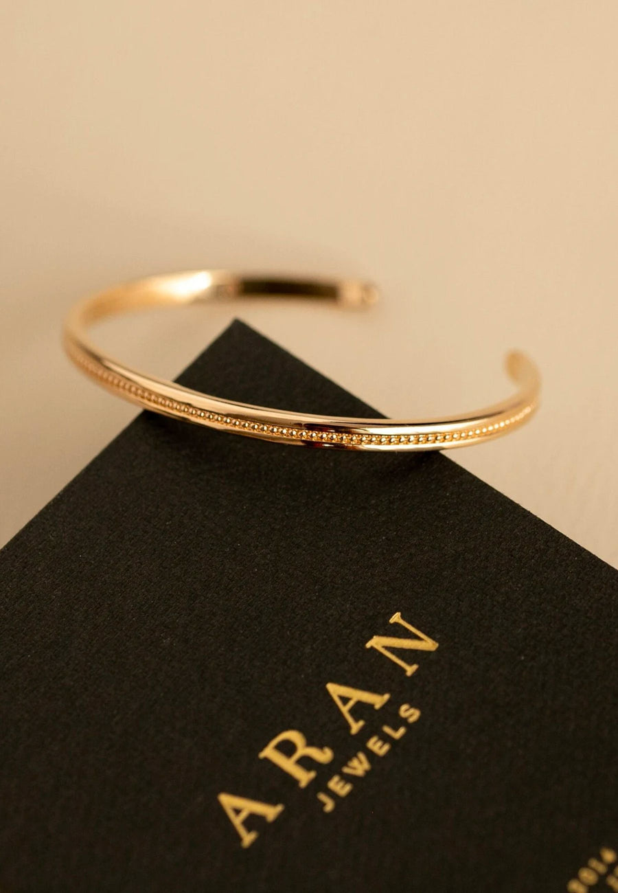 Pulsera de plata brazalete ovalado abierto fino con BOLITAS, rígido