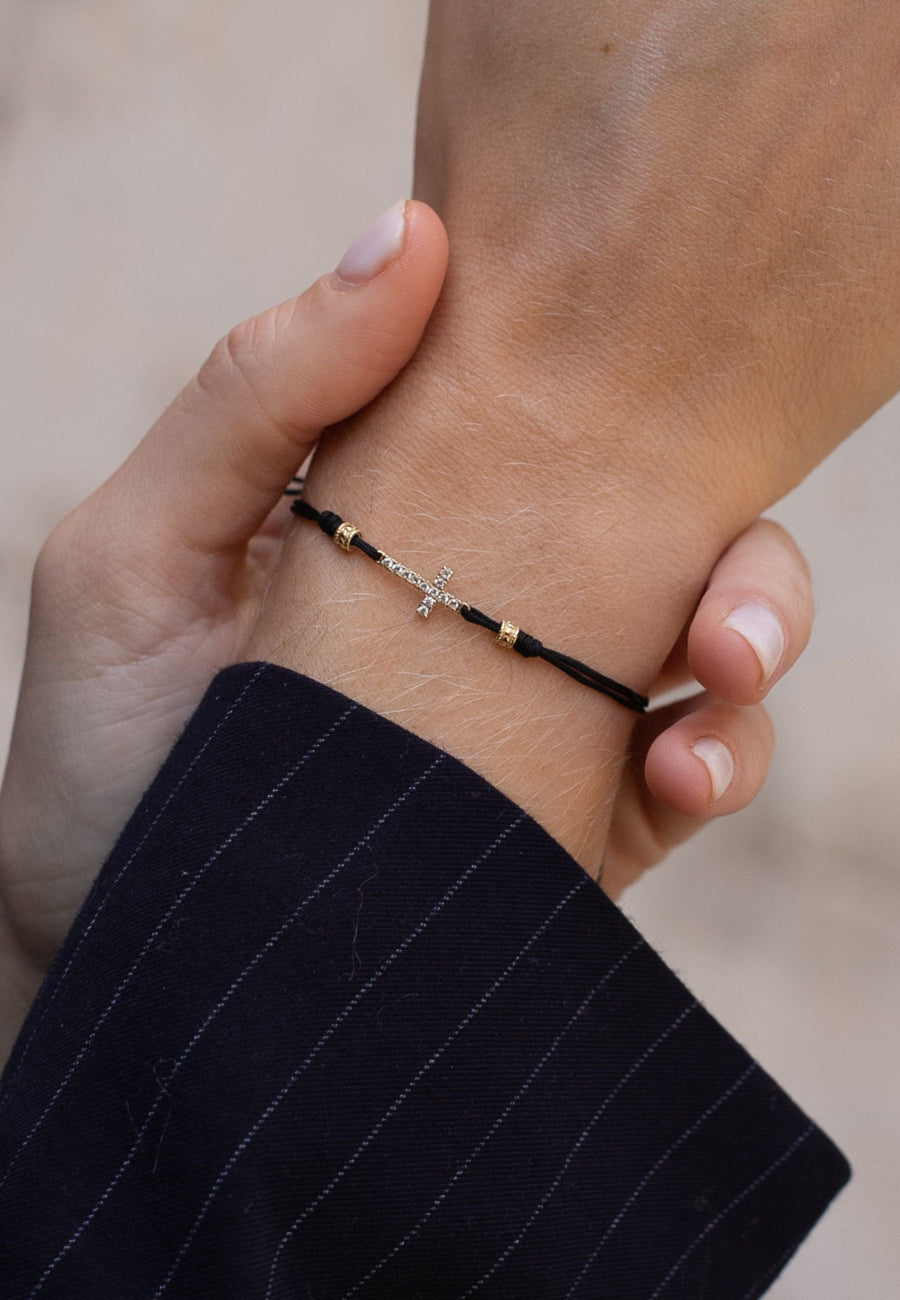 Pulsera cordón negro y CRUZ de circonitas en plata y baño oro