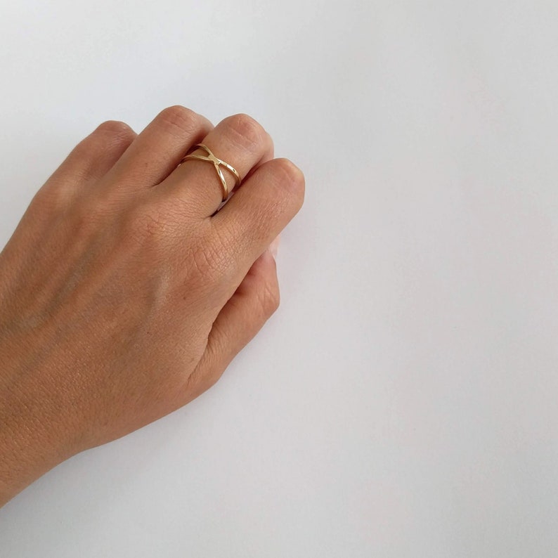 Anillo X ring en plata de ley y baño en oro