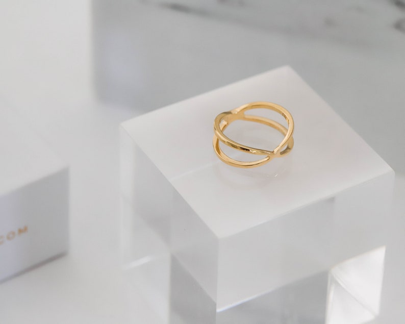 Anillo X ring en plata de ley y baño en oro