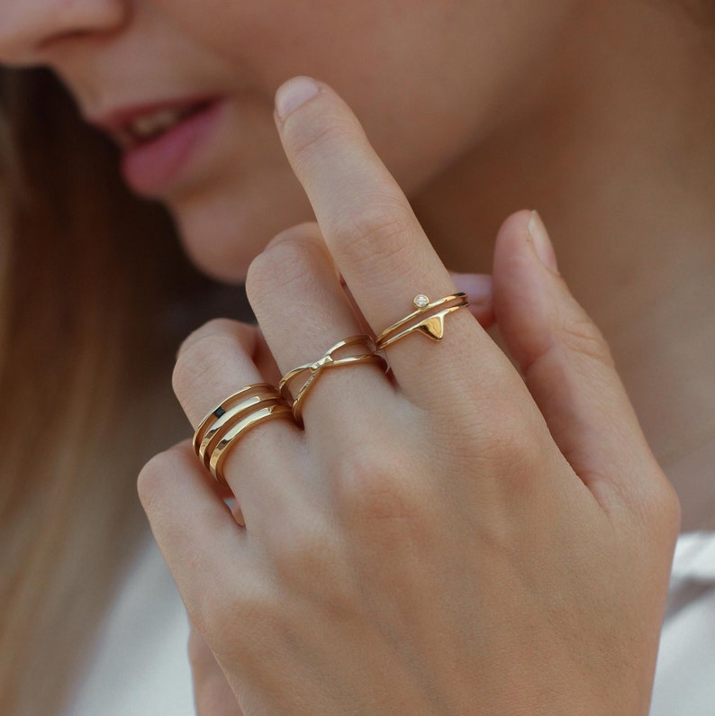 Anillo X ring en plata de ley y baño en oro