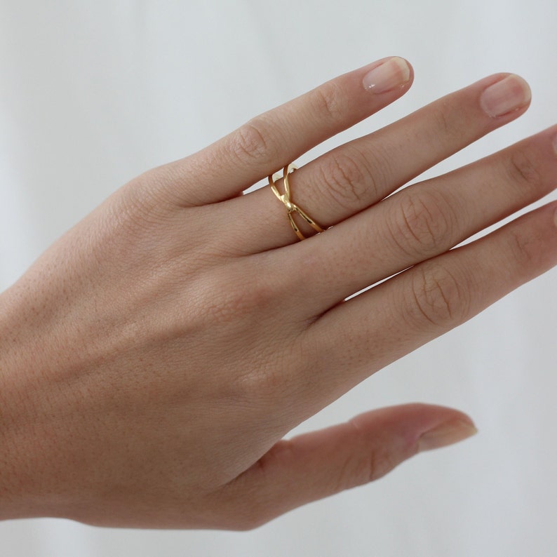 Anillo X ring en plata de ley y baño en oro