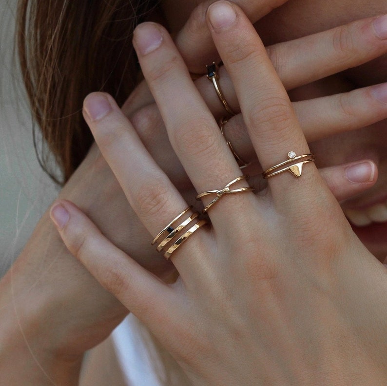 Anillo X ring en plata de ley y baño en oro