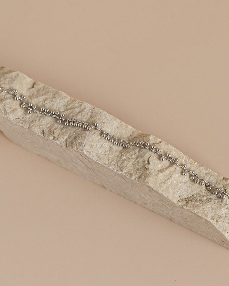 Xylophone bracelet with multiple beads