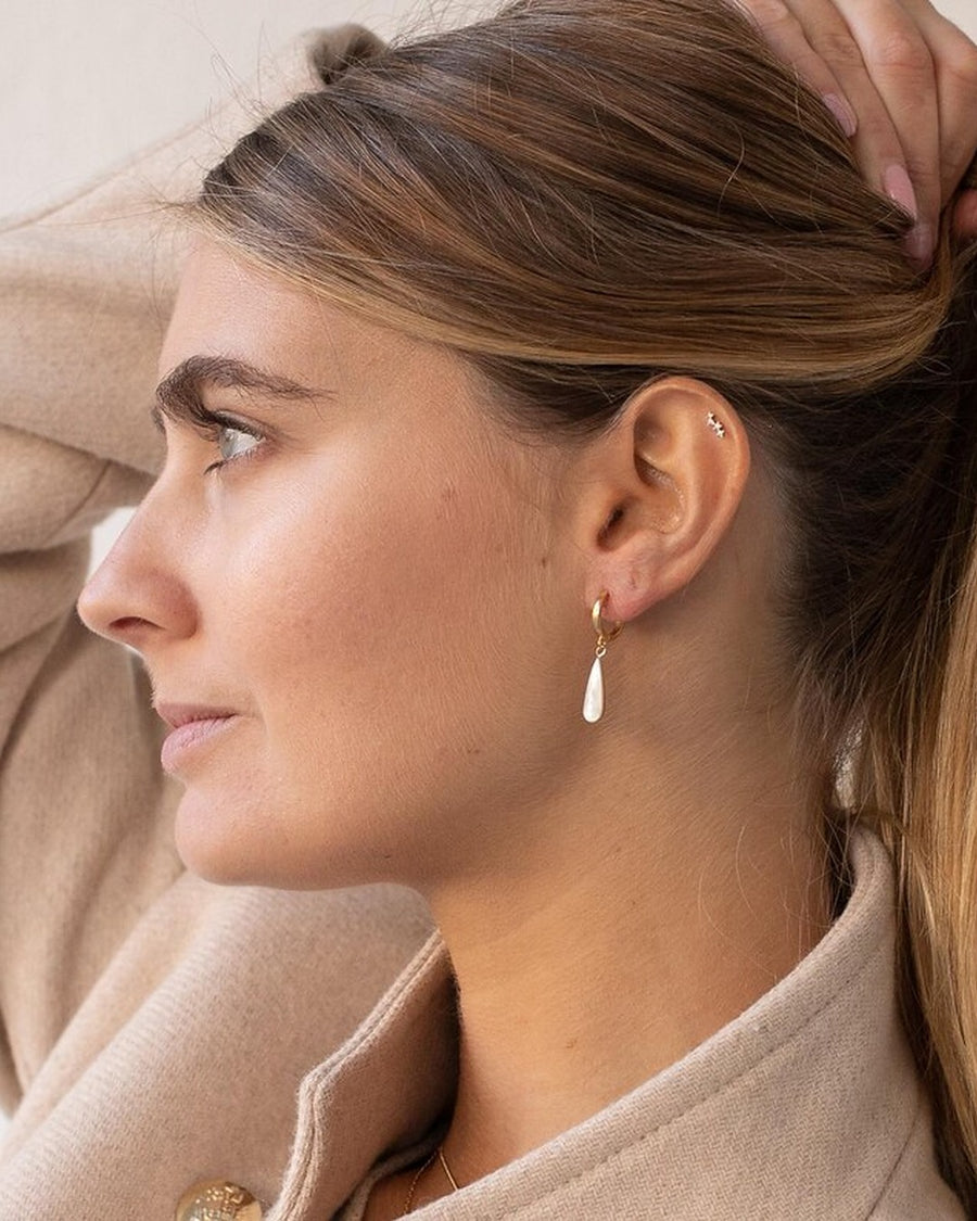 Gold mother-of-pearl teardrop pendant earrings