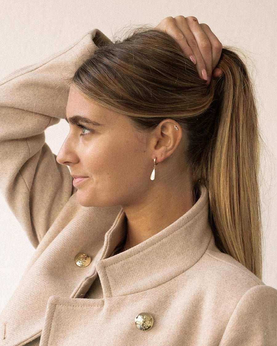 Gold mother-of-pearl teardrop pendant earrings