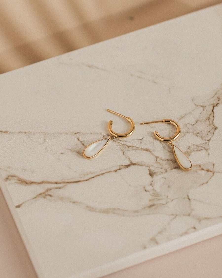 Gold mother-of-pearl teardrop pendant earrings