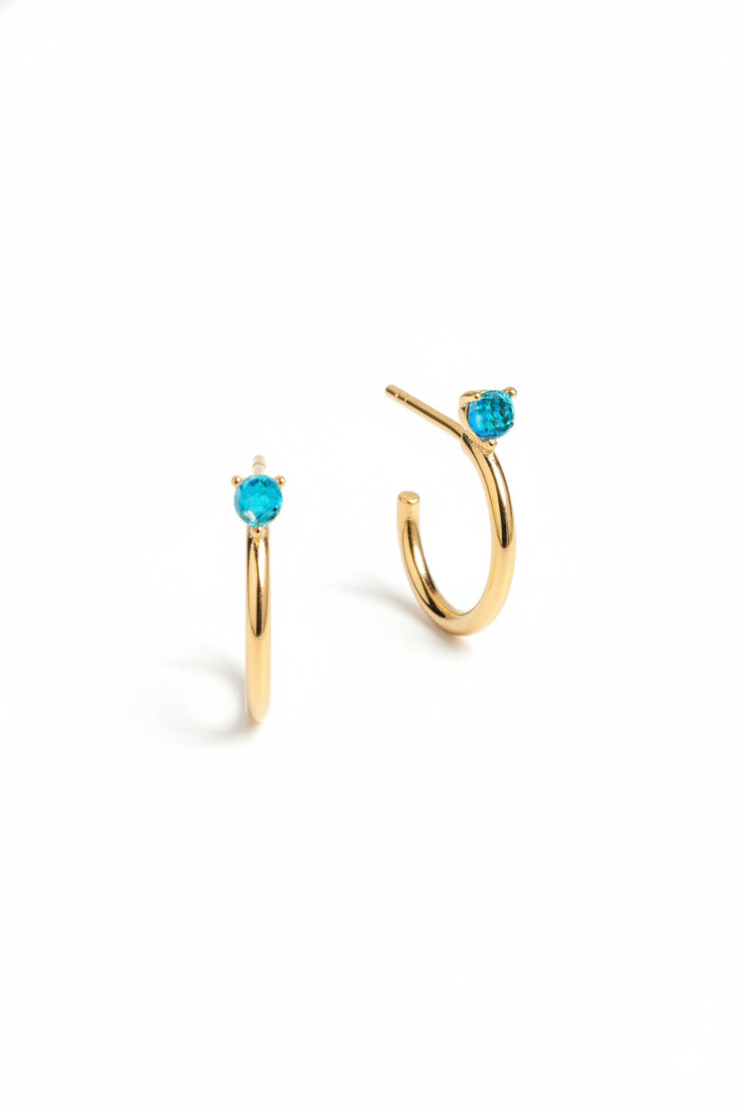 Pendientes OCEAN GLD. Plata de ley, baño oro, Zirconia azul. 