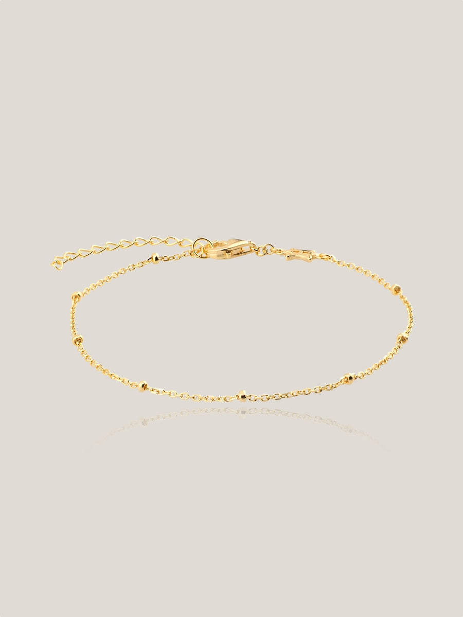 Pulsera mini BOLITAS GLD. Plata de ley, baño oro.